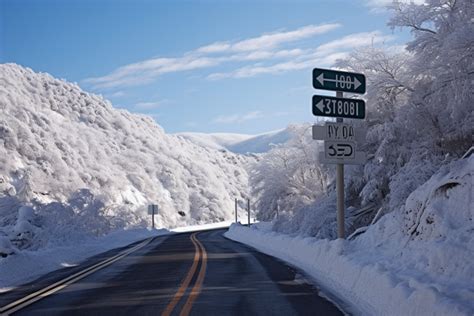 Snowy Road With Sign At Junction Background, Gangwon Do, Winter, High ...