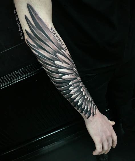 Men’s wing tattoo | Angel wings tattoo forearm, Wing tattoo, Tattoos