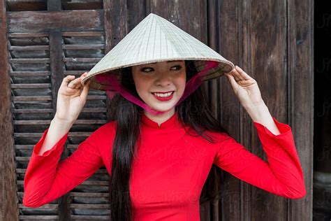 Vietnamese Women In Ao Dai, Traditional Costume, And Conical Hat by ...