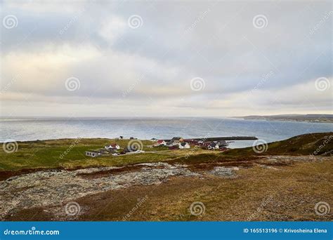 Varde, Norway - June 23, 2019: Calm Landscape with Water and Fishing Village on the Bank of a ...