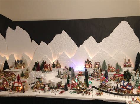 Magical Christmas Village with Mountain Carvings