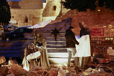 Sombre Bethlehem marks Christmas with vigil as bombs rain on Gaza