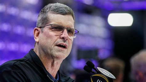 Michigan coach Jim Harbaugh addresses questions about his future