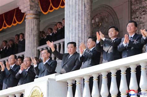 North Korea's Kim Jong Un oversees parade to honor grandfather