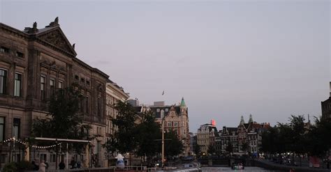 Cityscape with a River at Dusk · Free Stock Photo