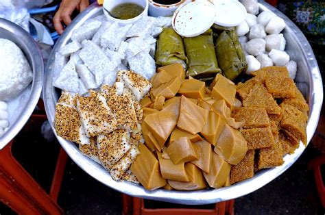 Taste assorted Myanmar traditional street-snacks made of rice. For more ...