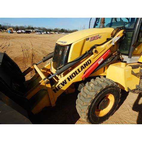 2012 NEW HOLLAND B95C Backhoe - J.M. Wood Auction Company, Inc.