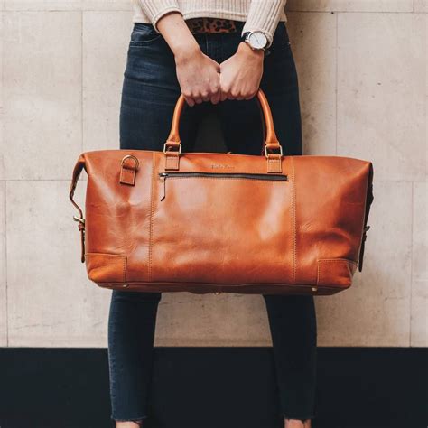 leather duffle bag | Leather holdall, Leather travel bag, Leather duffle bag