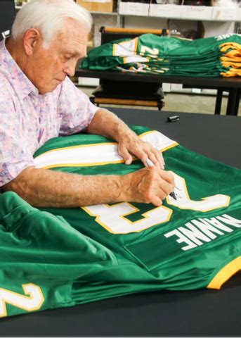 Lou Nanne Signing — Universal Sports Auctions