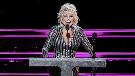 Dolly Parton teases 1st single off upcoming rock album 'World on Fire' | Flipboard