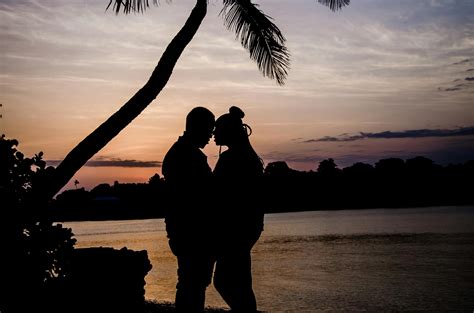 Two Person Hugging Near Tree during Sunset · Free Stock Photo