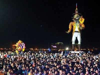 Scores of people gather to welcome New Year by burning the giant ...