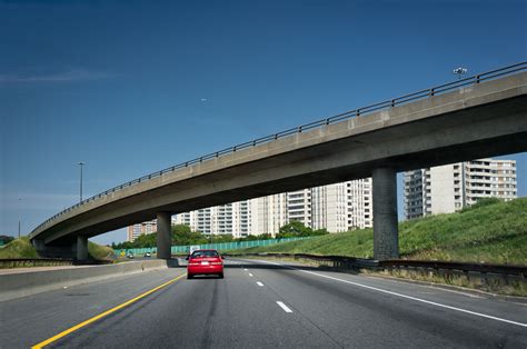 File:A flyover, a red car, and a plane (5920412449).jpg - Wikimedia Commons