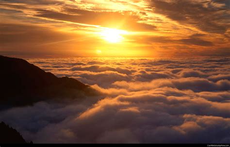 Can It Be Saturday Now .com ? - Sunset above clouds