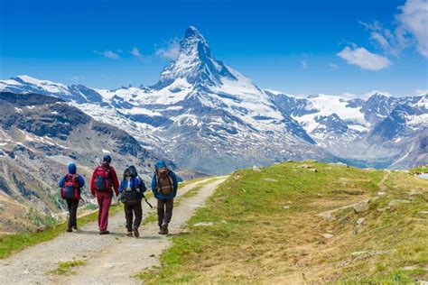 Matterhorn with hikers stock photo. Image of lake, environment - 2693172