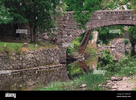 View of old stone bridge over river Stock Photo - Alamy