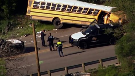 Two people killed, at least 10 injured in school bus crash