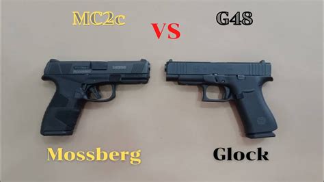 Mossberg mc2c vs Glock 48 - YouTube