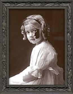 Sally the Broken Doll Haunted Portrait Prop