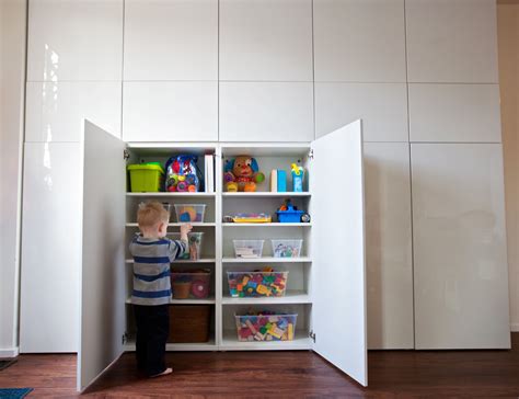 Our new basement cabinets! We used Ikea Besta modular cabinets, with their high-gloss white ...