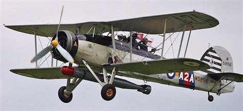 The British Fairey Swordfish torpedo bomber onboard this aircraft for damage, in particular, the ...