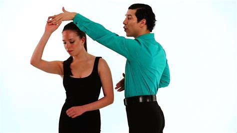 Learn how to do the follower's turn in merengue from professional dancers Ernesto Palma and ...