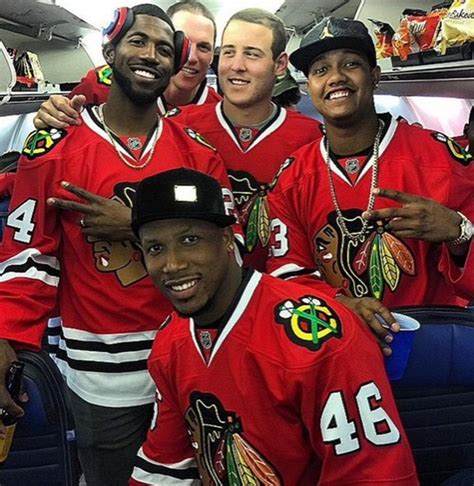 Cubs players wear Blackhawks jerseys after game in support of team | Larry Brown Sports