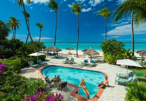 Our semi-private pool at Sandals Grande Antigua located steps from our room along the beach ...