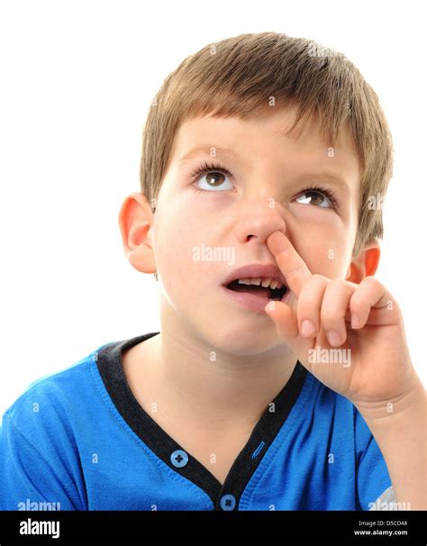 Boy picking his nose, young child picking their nose Stock Photo - Alamy