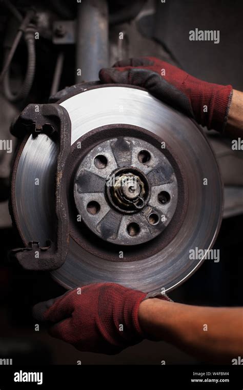 Repairing brakes on car Stock Photo - Alamy