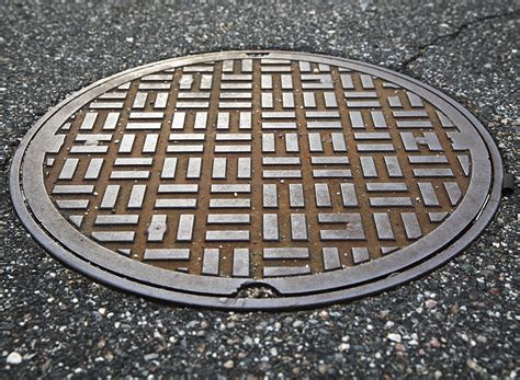 Manhole Frame and Cover Overview - American Cast Iron Products, Inc.