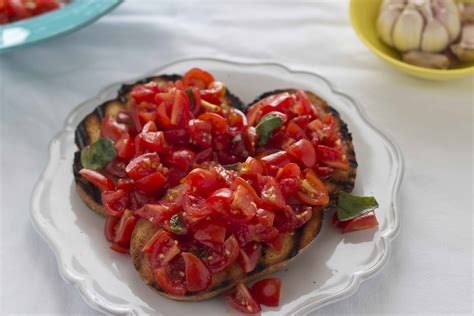 Bruschetta con pomodoro is a simple and healthy summer starter which is quick to prepare ...