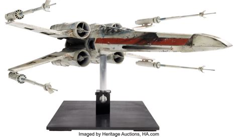 Bidding for the rediscovered movie prop "Red Leader" X-Wing fighter ...