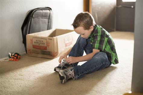 Boy Tying His Shoes