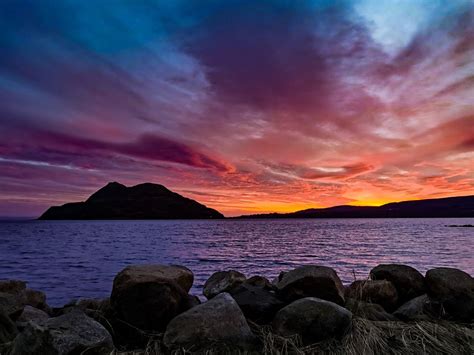 In pictures: Clouds create perfect conditions for stunning sunset - BBC News