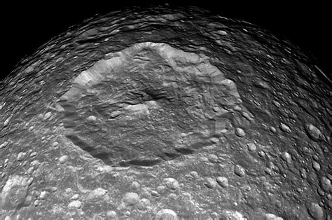 Herschel crater on Saturnian moon Mimas. It measures 139 km across ...