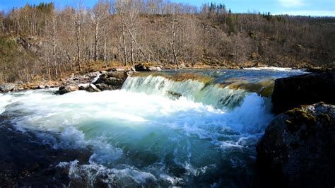 Nature sound of a waterfall flowing in the spring forest