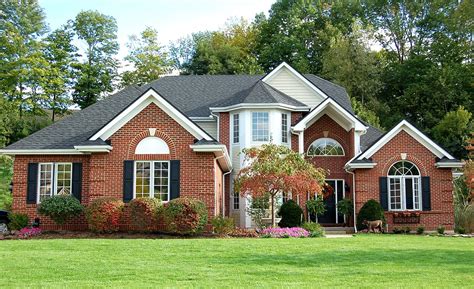 How to Choose a Roof Color for a Brick House - Nelson Contracting LLC