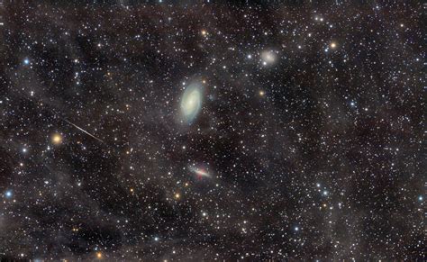 APOD: 2012 March 13 - The M81 Galaxy Group Through the Integrated Flux Nebula