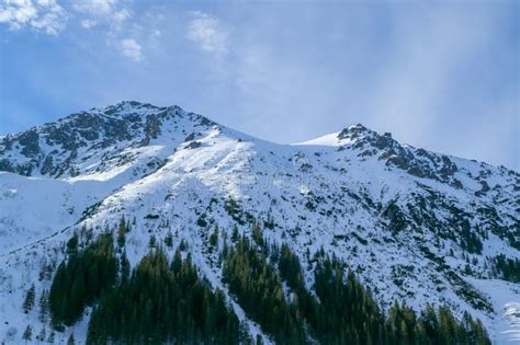 Snowy Mountain Peaks. Mountain Landscape. Winter in the Mountains. Blue Sky. White Snow Stock ...