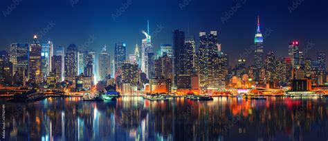 Panoramic view on Manhattan at night, New York, USA Stock Photo | Adobe ...