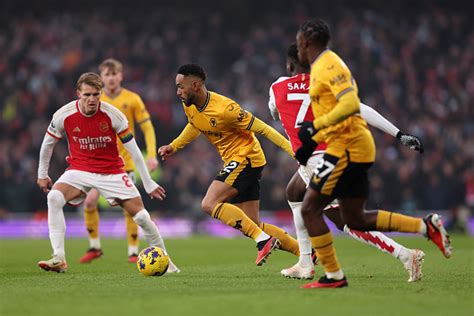 Matheus Cunha of Wolverhampton Wanderers runs with the ball whilst ...