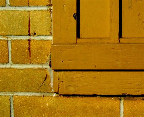 Yellow Ochre Wall Paint Drip Window Brick | Christopher Sessums | Flickr