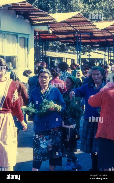 1980s archive photograph of local people buying food at Tashkent market ...