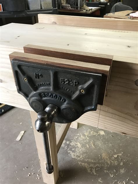 a work bench made out of wood and metal