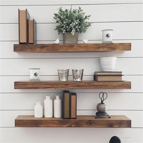 (rustic living room decor couch) | Wood floating shelves, Floating shelves, Floating shelves ...