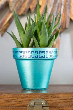 Make a stenciled succulent pot! Such a fun idea for a spring craft or even a gift! Diy Planters ...