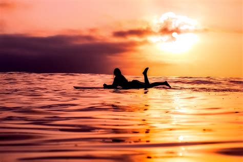 female-surfer-silhouette-on-the-ocean image - Free stock photo - Public Domain photo - CC0 Images