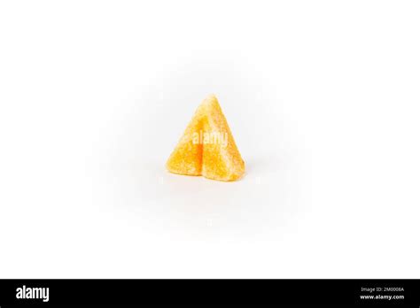 Single saffron spiced sugar cube shaped as a triangle Stock Photo - Alamy