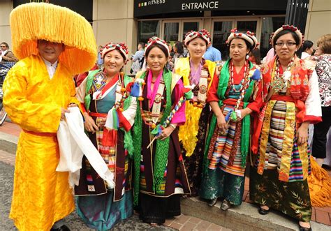 Wearing fabulous orange hat & traditional clothes Tibetan … | Flickr